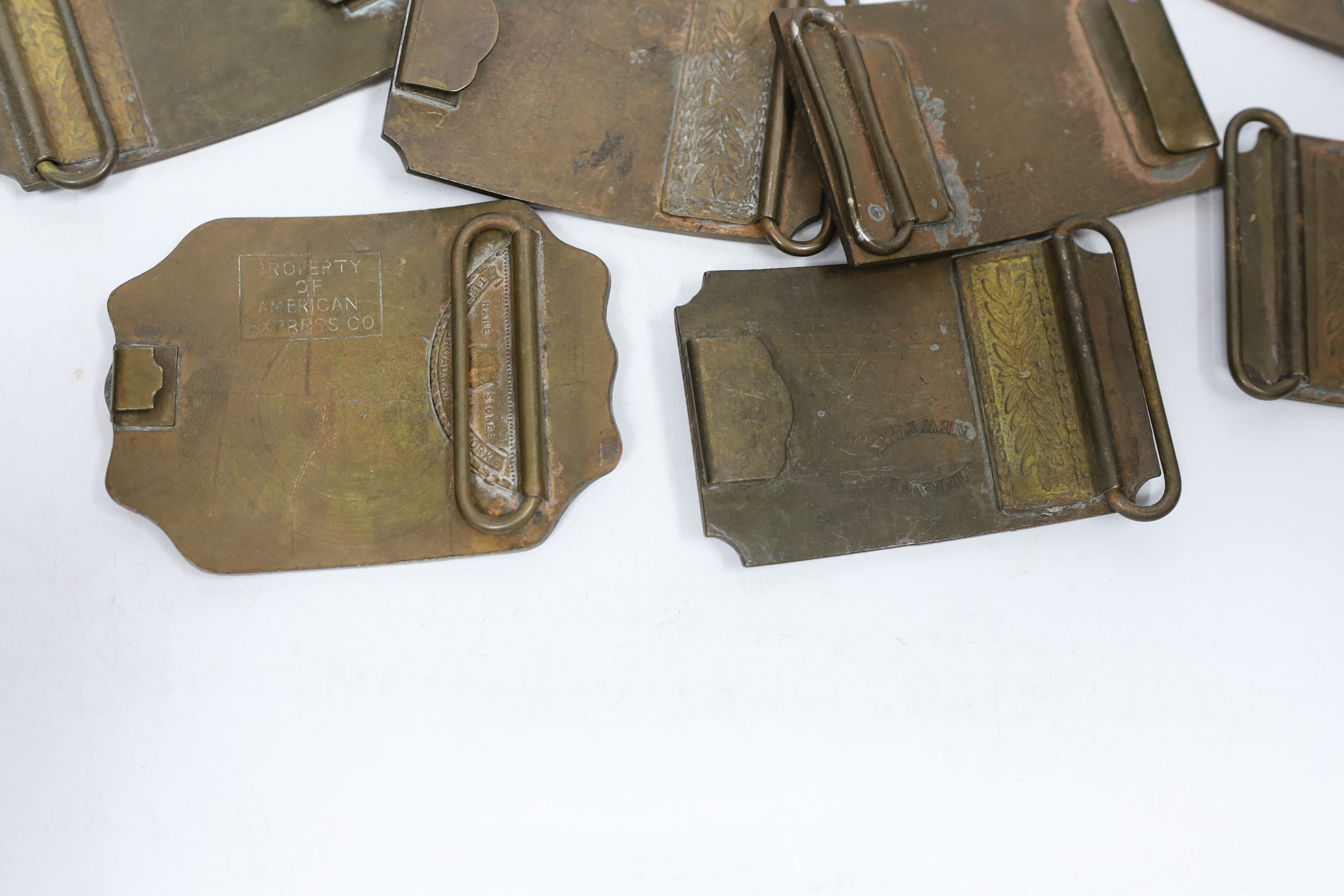 A collection of Wells Fargo and similar belt buckles, mostly by Tiffany & Co.